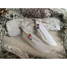 Pendientes plumas